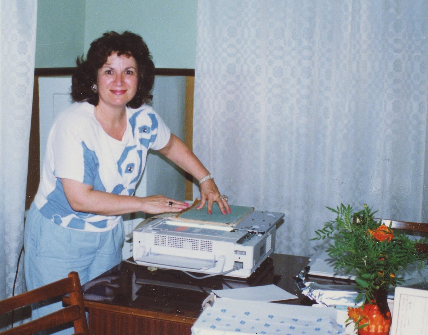 Miriam Weiner makes photo copy of her grandmother's birth record